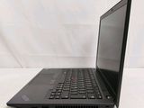 the laptop is open and ready to be used on the bed
