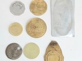 a lot of coins that are sitting on a table