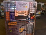 a cart with a lot of items in it in a warehouse