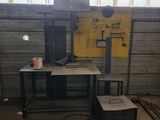 a computer sitting on a table in a room