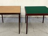 pair of mid - century modern side tables with green tops