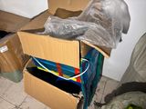a cardboard box with a bunch of items inside of it