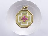 a gold and pink pendant with a cross on it