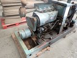 a machine that is sitting on a pallet in a warehouse