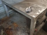 a table that is sitting in the middle of a room