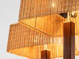 a lamp that is sitting on top of a wooden pole