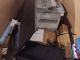 a box full of electronic equipment and a laptop