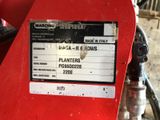 a label on the back of a red tractor