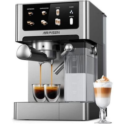 a silver coffee machine with two cups of coffee next to it
