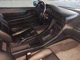 a picture of a car interior with a steering wheel