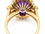an amethorate and diamond ring set in yellow gold