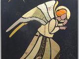 une image représentant un ange peint sur fond noir