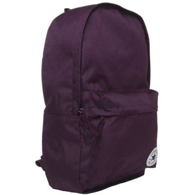 un sac à dos violet muni d'une fermeture éclair sur le devant