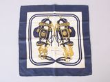 blue and white square scarf with a picture of a pair of purses on it
