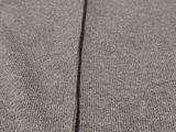 a close up of a gray sweater with a zipper on the back