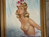 un tableau représentant une femme coiffée d'un chapeau