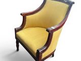 an image of a yellow and black chair on a white background