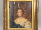 un tableau représentant une femme en robe bleue, dans un cadre doré