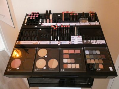 a table with a lot of makeup on it