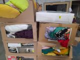 several cardboard boxes stacked on top of each other in a room