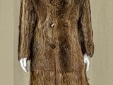 an image of a mannequin dressed in a fur coat