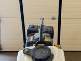 a small machine that is sitting in a garage