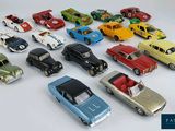 a lot of toy cars that are sitting on a table