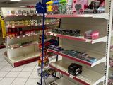 a lot of shelves in the store with toys on them