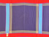 purple, blue, and red plaid blanket on a white background