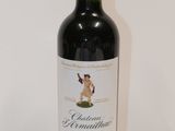 a bottle of wine that is sitting on a table