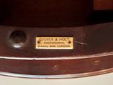 a close up of a metal object with a label on it