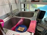 a blue plate with a piece of food in it