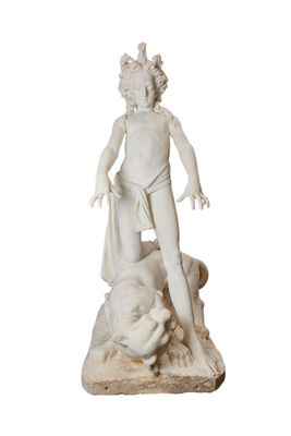 statue of a boy on a rock with a dog on a white background