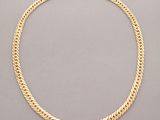 an 18k yellow gold curbet necklace