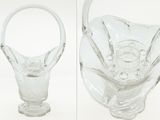 two pictures of a clear glass vase with a handle