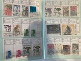 a book with stamps and stamps on it that are on display