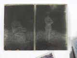 an old black and white photo of a baseball player holding a bat