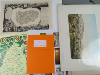 many different types of art on display on the table