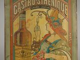 un vieux livre sur lequel figure l'image d'une femme tenant une bouteille d'alcool