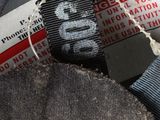 a close up of a belt on the back of a jacket