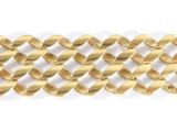a close up of a gold chain bracelet on a white background