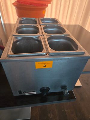 une image représentant une plaque de cuisson équipée de quatre plaques chauffantes