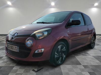 a picture of a red car parked in a garage