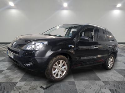 a picture of a black suv parked in a garage