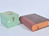 two small boxes that are sitting next to each other