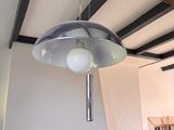 a light that is hanging from the ceiling in the room