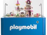une boîte bleue contenant un ensemble Playmobil