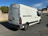 a white van that is parked in the parking lot