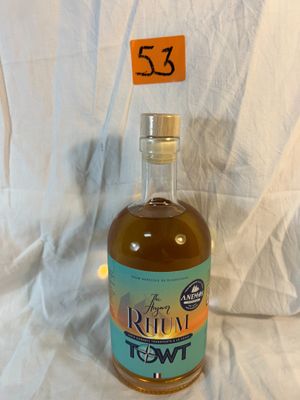 a bottle of rum that is sitting on a table
