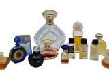 many different types of perfume bottles on a white background
